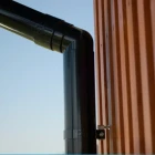 bryza-pvc-grafitowy-obejma-rury-110mm-realizacja