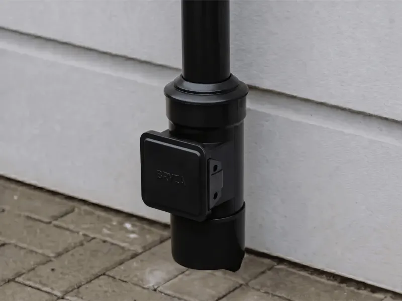 bryza systemy rynnowe pvc redukcja czarna realizacja